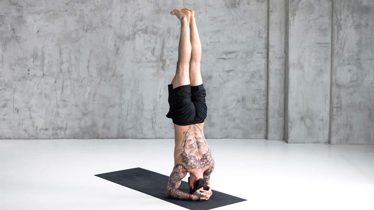 Headstand woman Cut Out Stock Images & Pictures - Alamy